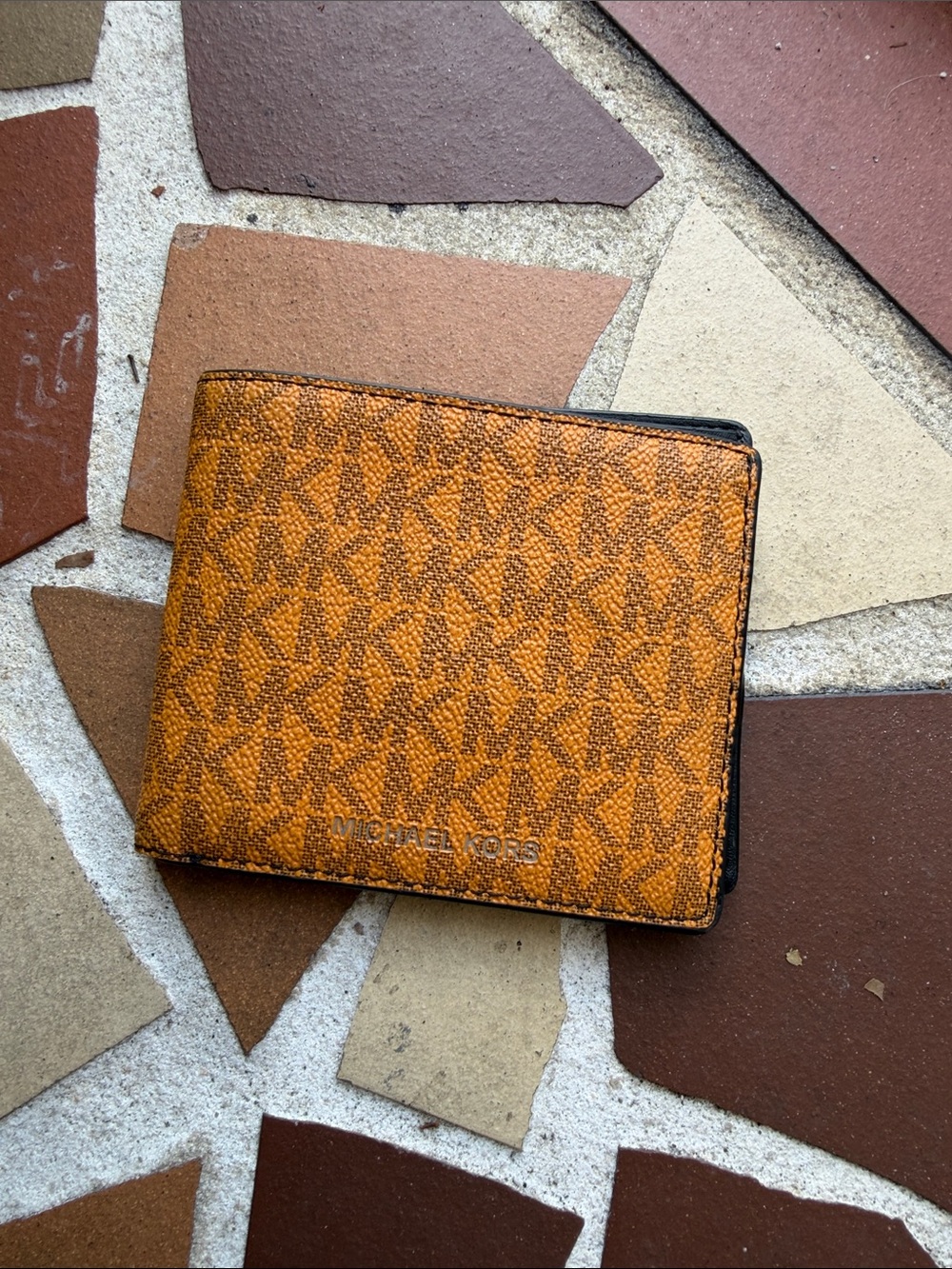 Michael Kors Cooper Mens Orange Monogram MK Bifold Wallet. EUC